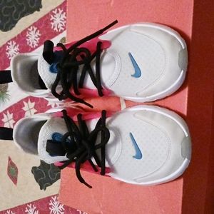 Nike pink and white shoes size 2